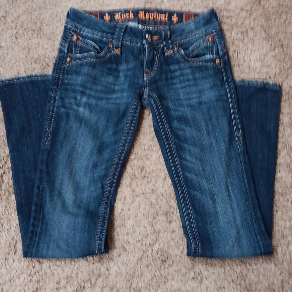 Rock revival boot cut jeans size 25, inseam 32 rise 7. No holes fits like a 24!